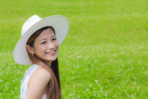Park green and young smiling woman