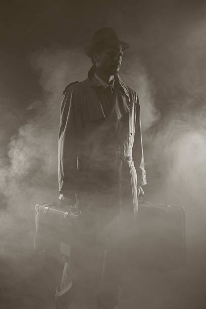 istock Mysterious man leaving late at night 587814732