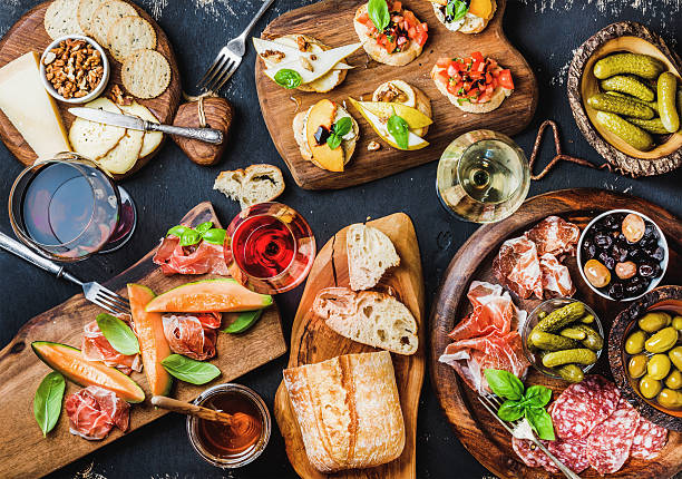 istock Italian antipasti wine snacks set over black grunge background 587815190