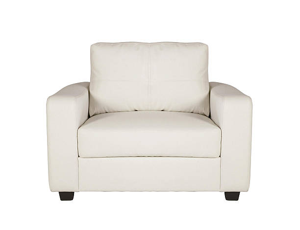 istock studio shot of a leather white armchair isolated 587815796