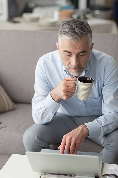 istock Businessman having a coffee break 587817216