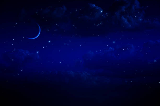 istock Night Sky with Stars and Clouds 587818562