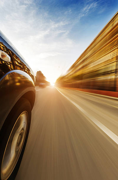 istock car on the road with motion blur background. 587878060