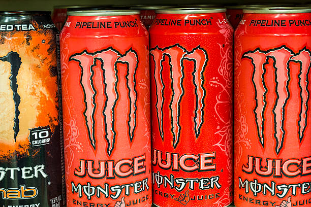 Monster Beverage Display I Indianapolis, US - August 10, 2016: Monster Beverage Display. Monster Corporation manufactures energy drinks including Monster Energy I monster energy stock pictures, royalty-free photos & images