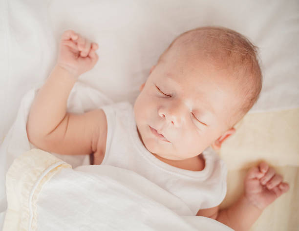 istock newborn baby boy sleeping 587882628