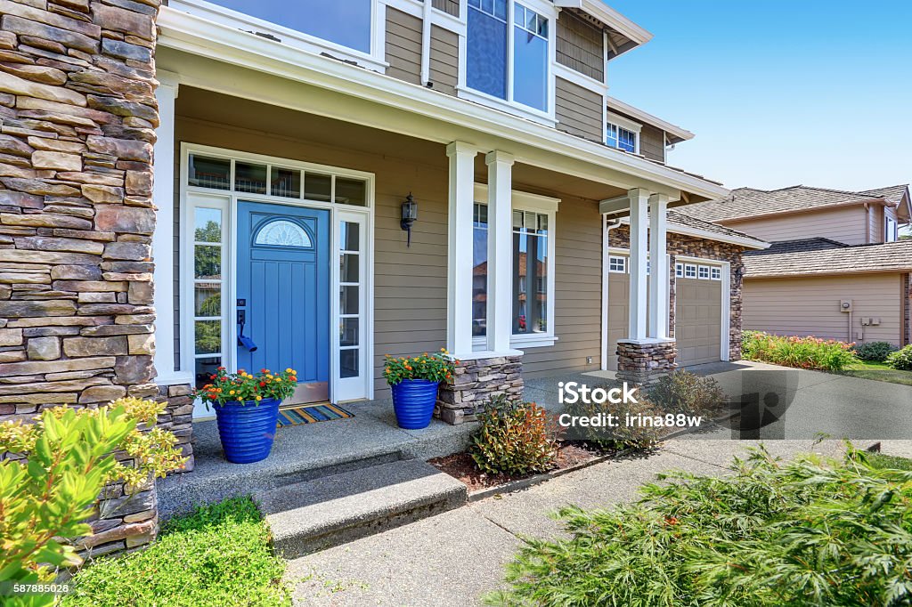 Very neat American house with gorgeous outdoor landscape. A very neat American house with gorgeous outdoor landscape. Northwest, USA. Front Door Stock Photo