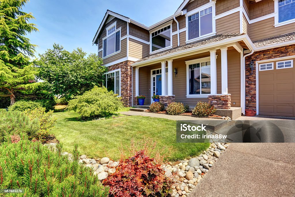 Very neat American house with gorgeous outdoor landscape. A very neat American house with gorgeous outdoor landscape. Northwest, USA. Residential District Stock Photo