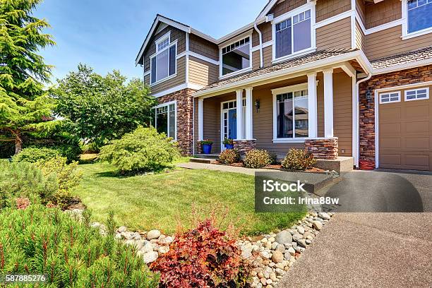 Very Neat American House With Gorgeous Outdoor Landscape Stock Photo - Download Image Now