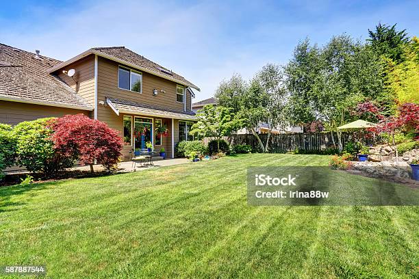 Backyard Garden With Beautiful Landscape Stock Photo - Download Image Now - Yard - Grounds, House, Small