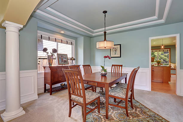 istock Dining room interior with mint walls and coffered ceiling. 587888662