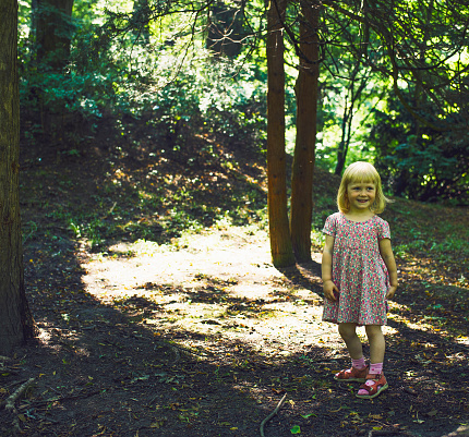Little Girl in Forest