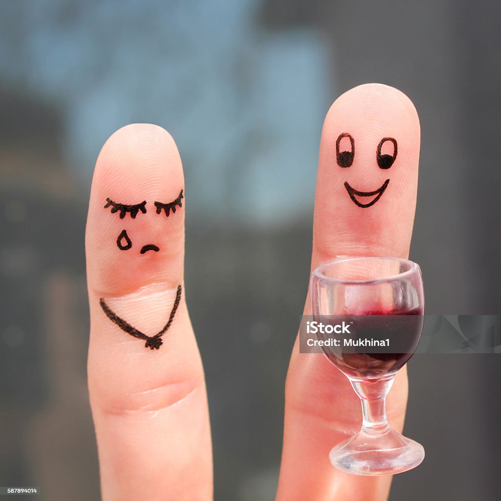 Finger art of couple. Woman is upset because man drunk. Addiction Stock Photo