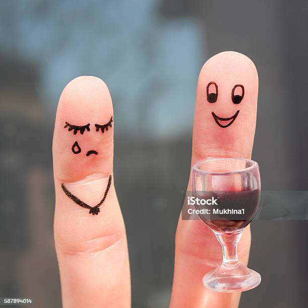 Finger Art Of Couple Woman Is Upset Because Man Drunk Stock Photo - Download Image Now
