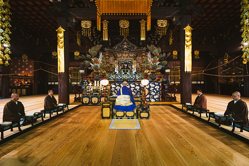 Afternoon prayer in Chijon-ji Buddhist Shrine in Kyoto. Location: Kyoto, Japan