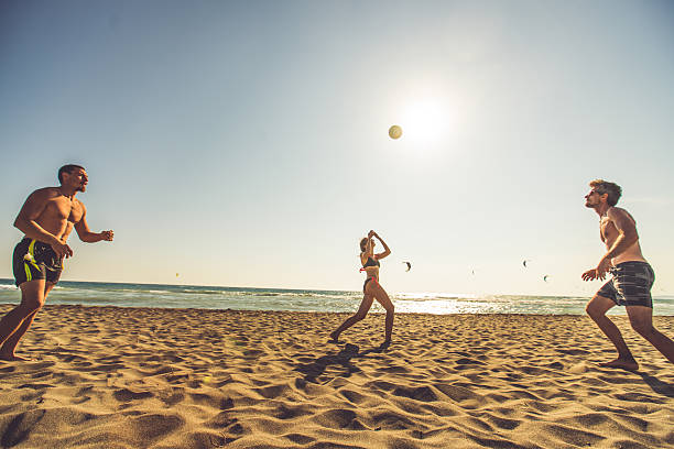 istock Friends on the beach 587895048