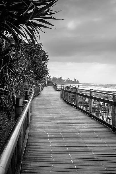 Sunshine Coast Boardwalk The boardwalk connects the beaches in Caloundra, the beautiful beach town in Queensland, Australia. There are similar boardwalks everywhere in the Sunshine coast. caloundra stock pictures, royalty-free photos & images