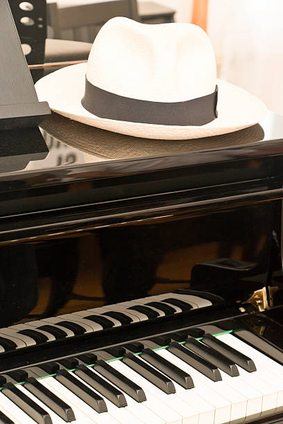 istock Pianist Hat on the Piano 587900390