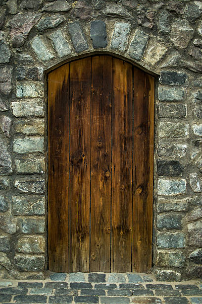 istock brown wooden doors 587902438