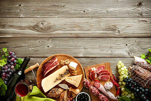istock Romantic dinner with wine, cheese and traditional sausages 587911928