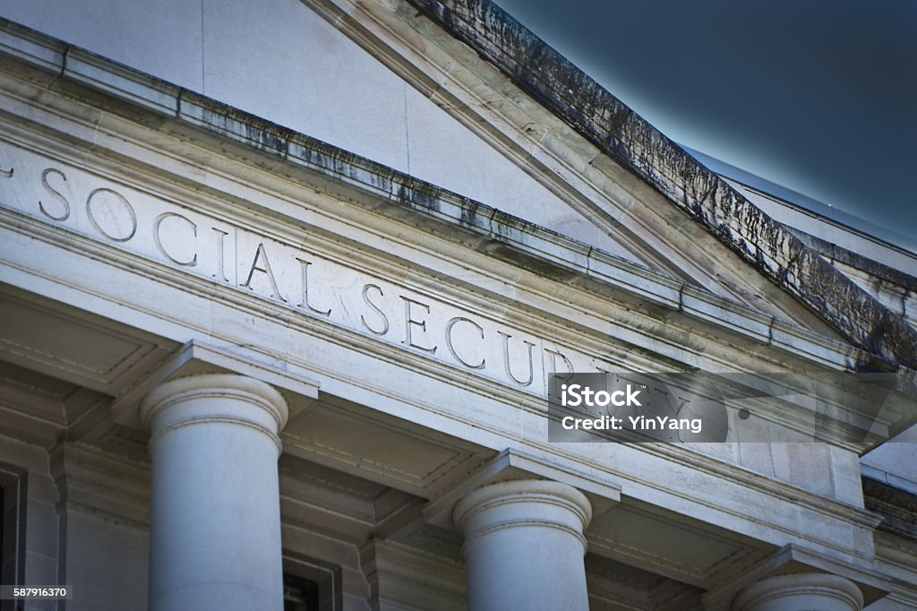 Social Security Agency Government Building Sign The U.S. government Social Security Agency Building. The entrance sign of the agency. A classical government building for the social security service. Photographed in horizontal format. Social Security Stock Photo