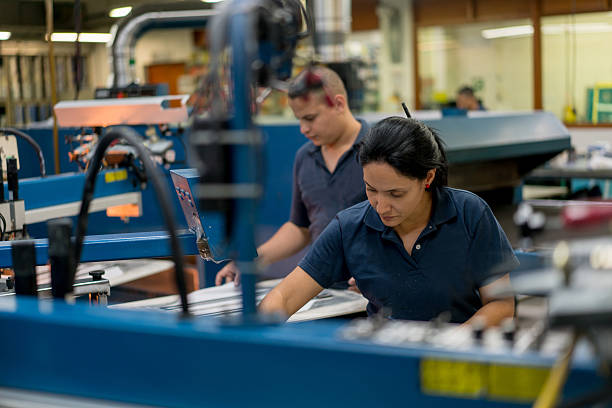 People textile printing at a factory