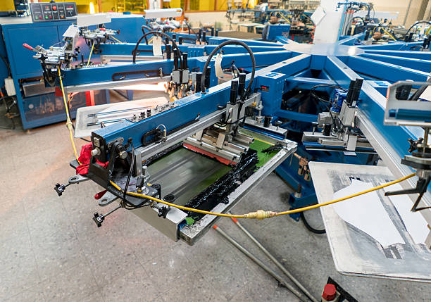 istock Printing machine at a clothing factory 587929134