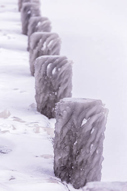 istock Cold winter day with many ice on the harbor 587932178