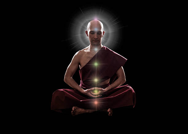 monge budista em pose de meditação com chakras coloridos - lotus position - fotografias e filmes do acervo