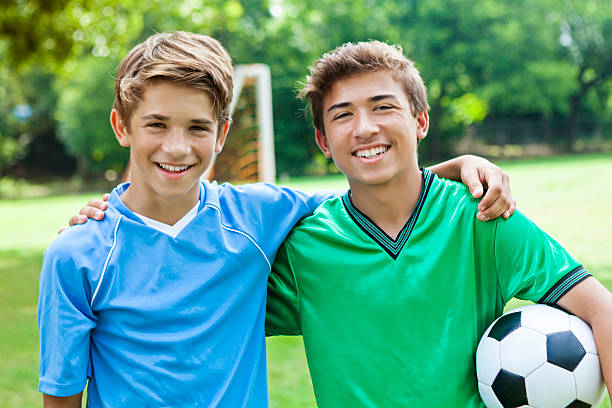 istock Handsome young soccer player buddies 587934070