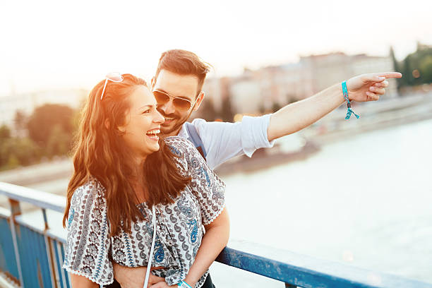 istock Happy couple bonding outdoors 587934172