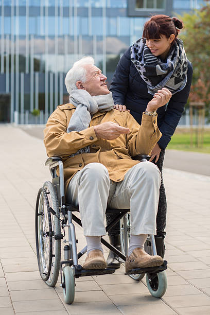 istock Disabled grandpa and granddaughter 587935520