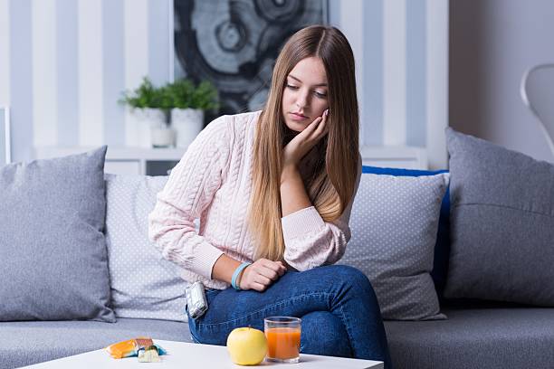 istock Sad female with hypoglycemia 587935752