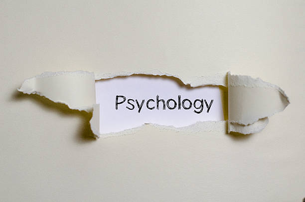istock The word psychology appearing behind torn paper. 587937744