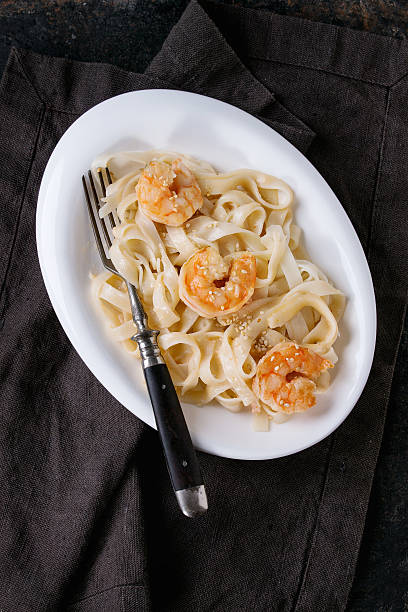 istock Udon noodles with shrimps 587938432
