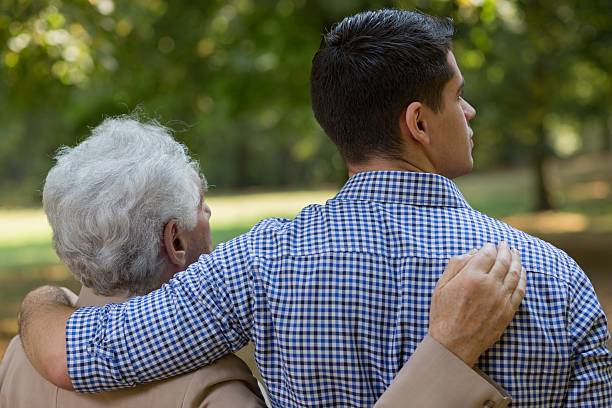 istock Caring grandson and grandpa 587938590