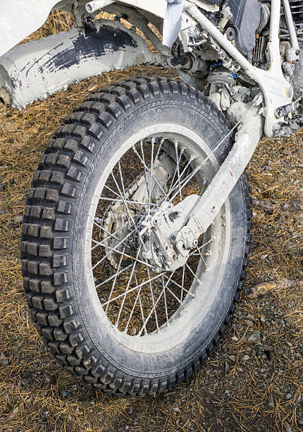 istock Rear motorcycle wheel with enduro tire 587938986