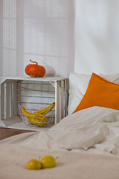 istock Autumn in simple bedroom 587940976