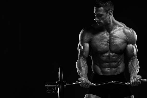 culturismo - human muscle body building exercising black and white - fotografias e filmes do acervo