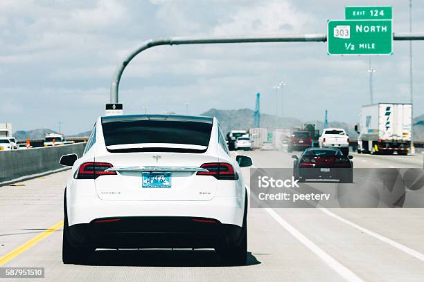 Tesla Model X On The Road In Arizona Stock Photo - Download Image Now - Rear View, Car, Tesla Motors