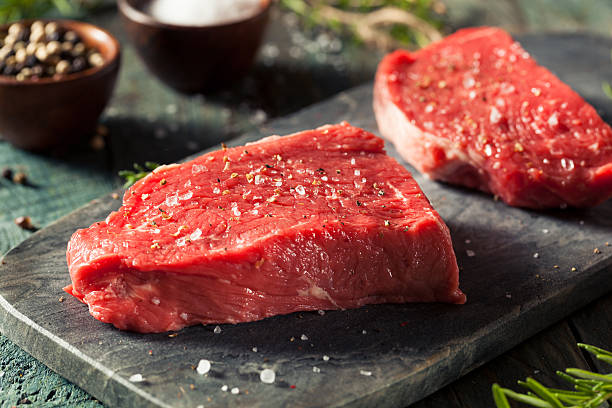 Raw Organic Grass Fed Sirloin Steak Raw Organic Grass Fed Sirloin Steak with Salt and Pepper raw food stock pictures, royalty-free photos & images