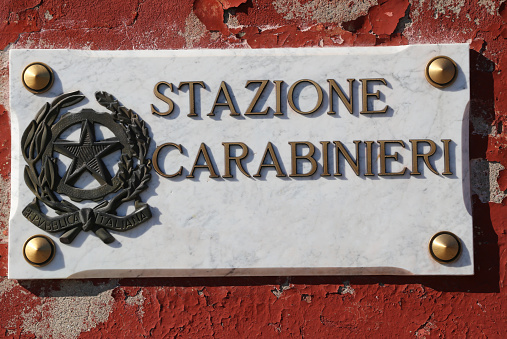 written STAZIONE CARABINIERI who in Italian means Italian police