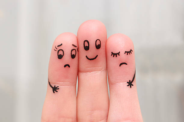 Finger art. Happy man embraces two women Finger art. Happy man embraces two women, they do not like it. menage trois stock pictures, royalty-free photos & images
