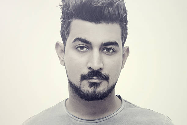 istock Handsome serious beauty male model closeup portrait 588233962