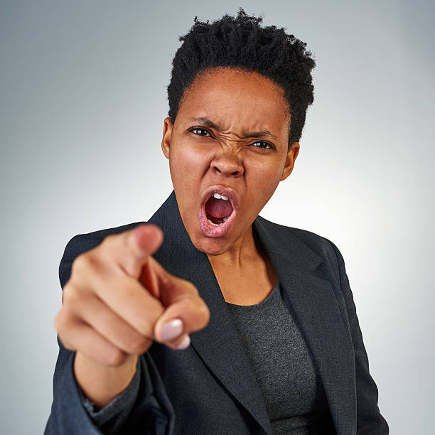 it's all your fault! - behavior women anger pointing imagens e fotografias de stock