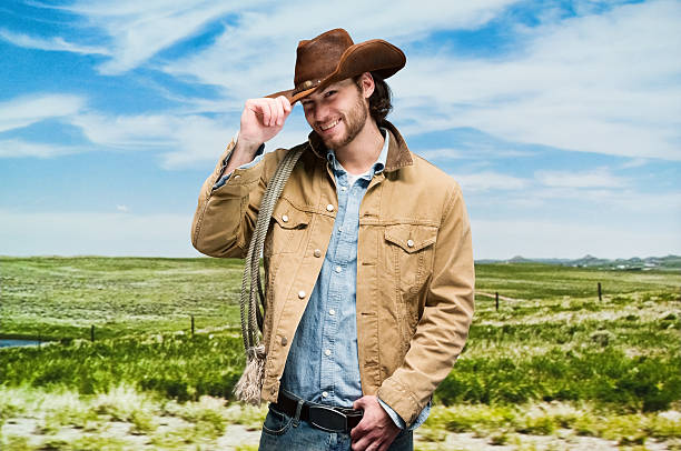 istock Smiling cowboy standing outdoors 588234978