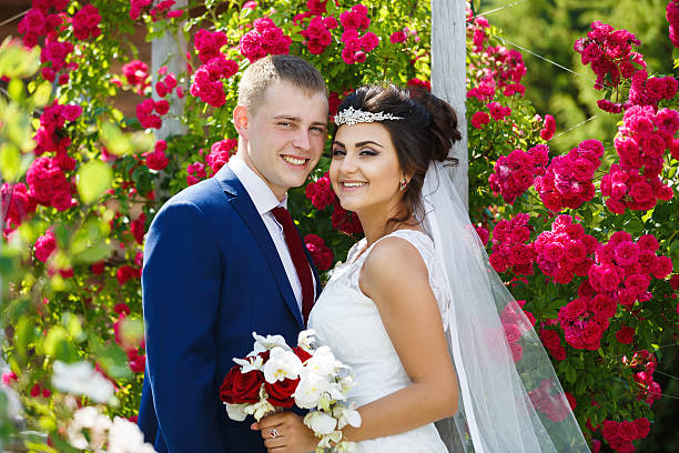 istock Wedding couple in a garden 588240780