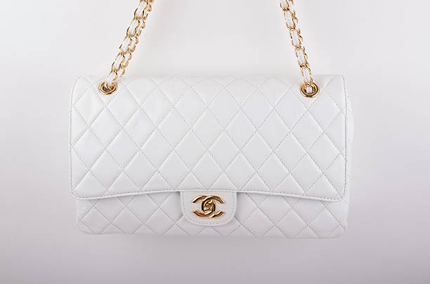 white and gold chanel purse