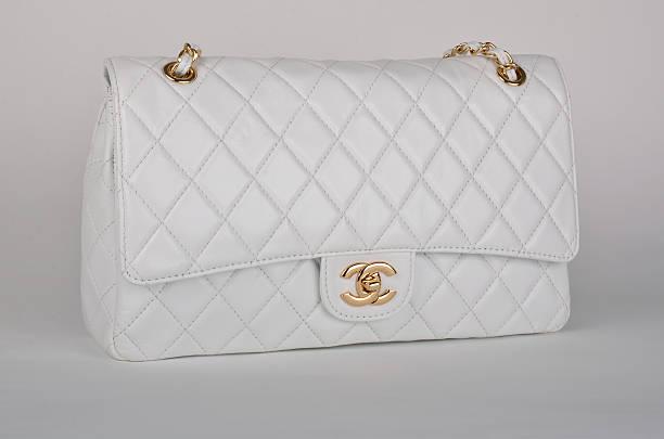 White Chanel Bag Stock Photo - Download Image Now - Bag, Chanel - Designer  Label, Arts Culture and Entertainment - iStock