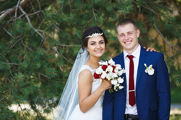 istock Wedding couple in the pine forest 588242904