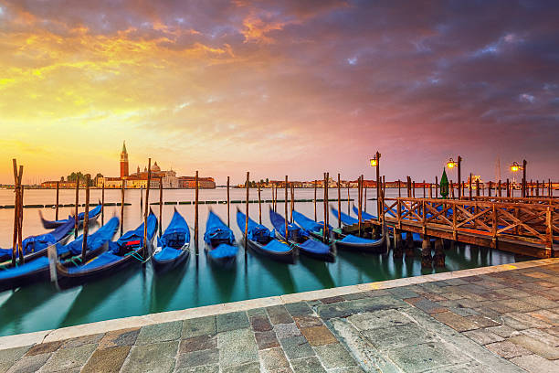 Gondolas in Venice at surise stock photo